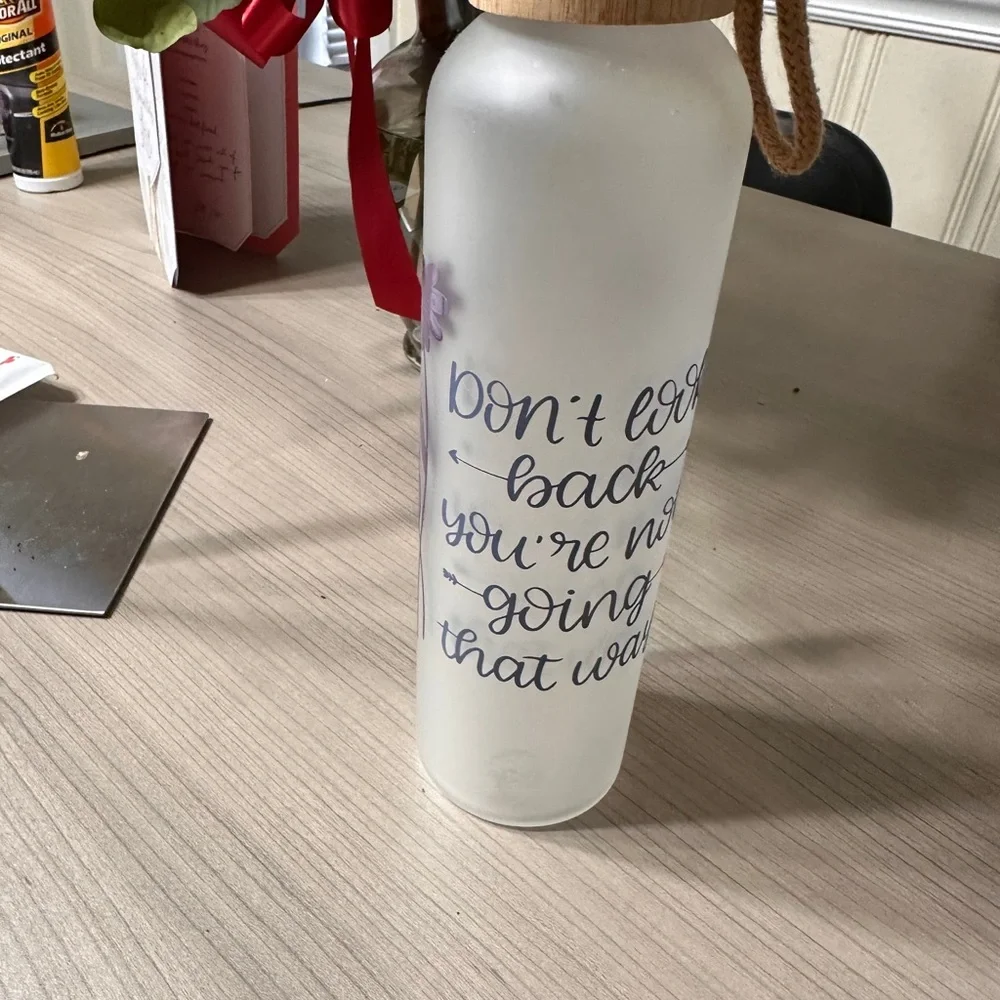 Inspirational Frosted Glass Water Bottle with Purple Design